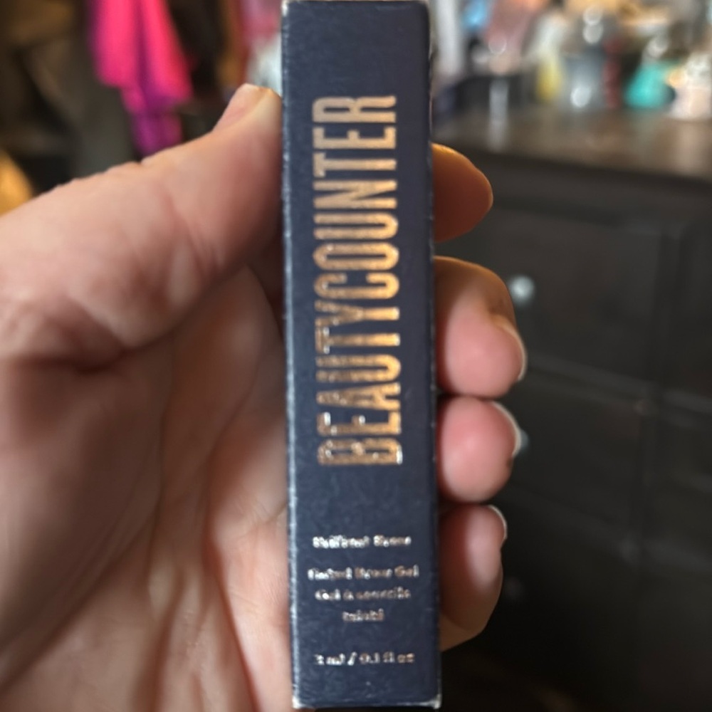 Beautycounter, tinted brow gel in soft black.